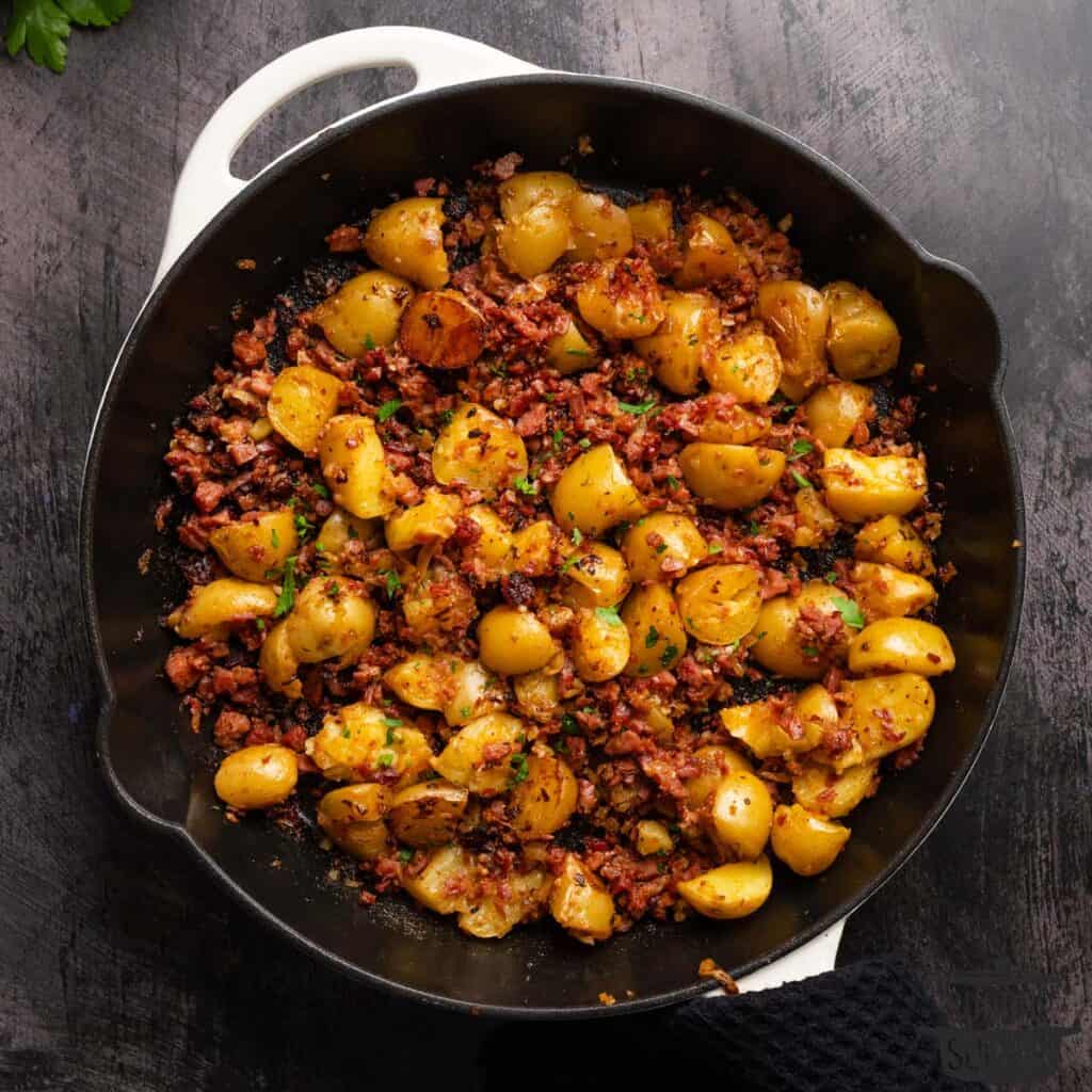 a skillet with corned beef hash