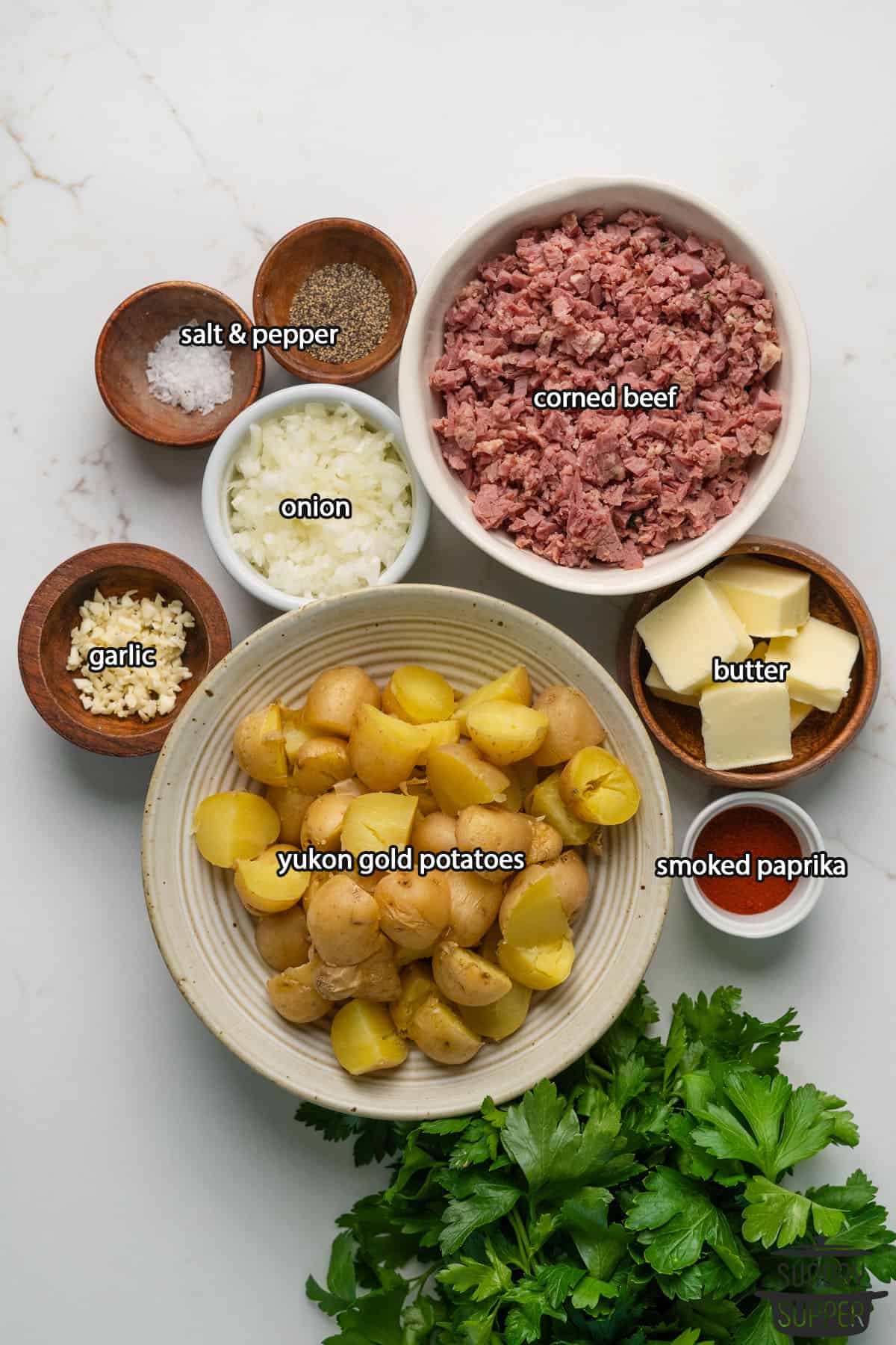 all the ingredients for corned beef hash with labels