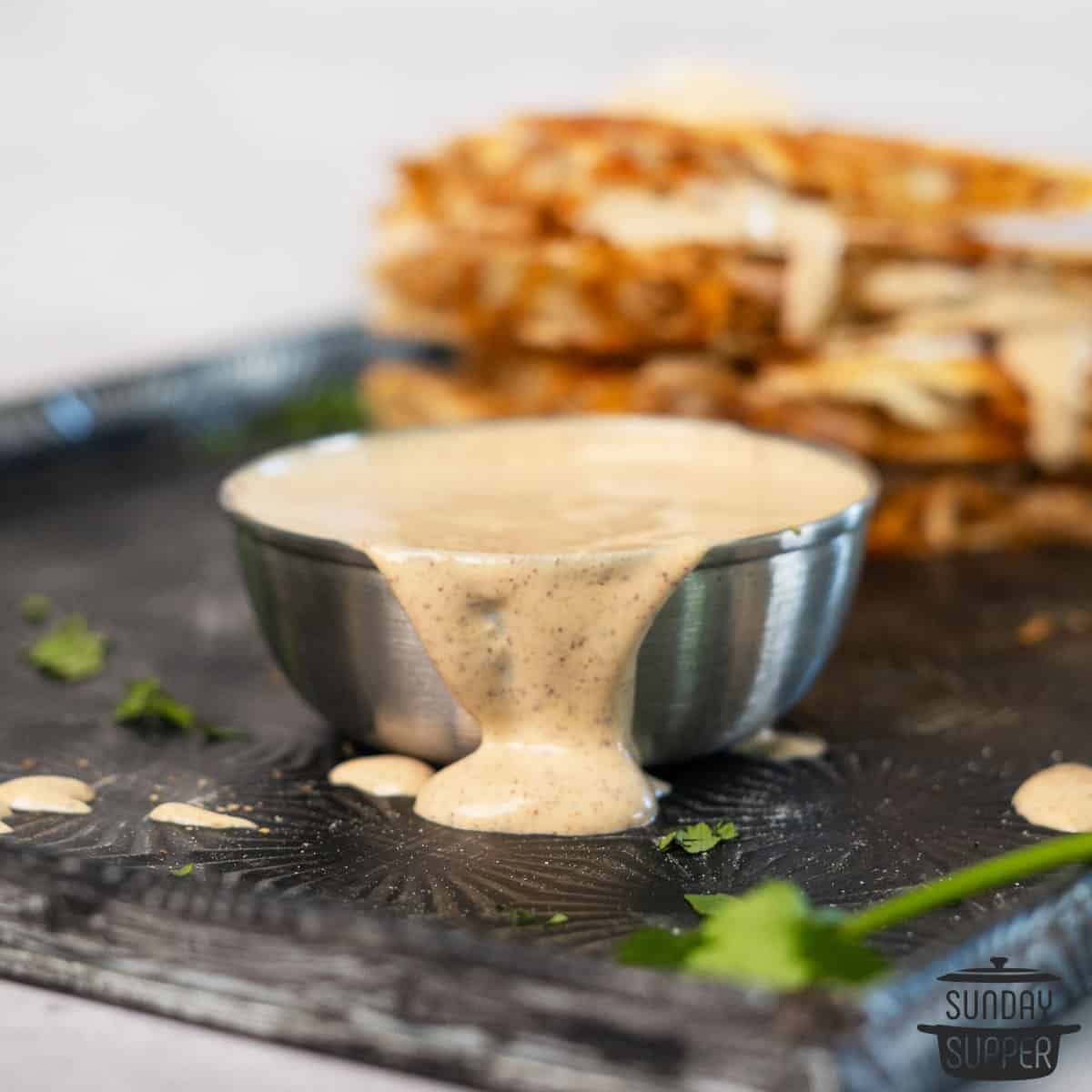 quesadilla sauce in a small metal bowl