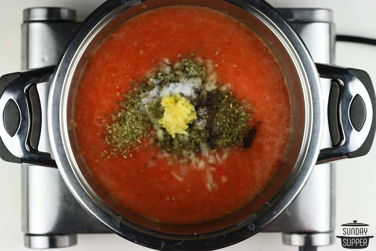 the sauce ingredients added to a pot