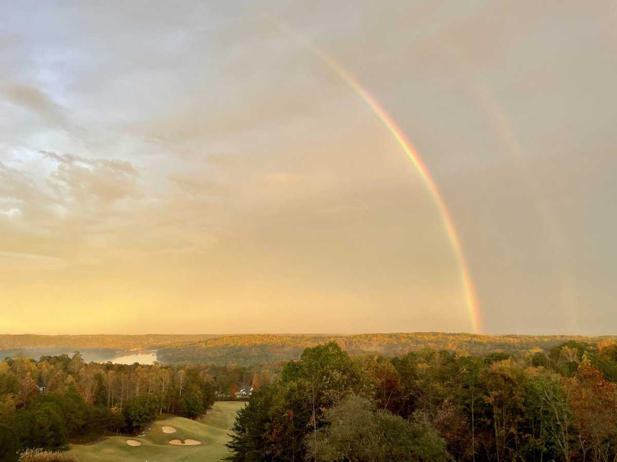 a beautiful view of georgia with a double rainbow