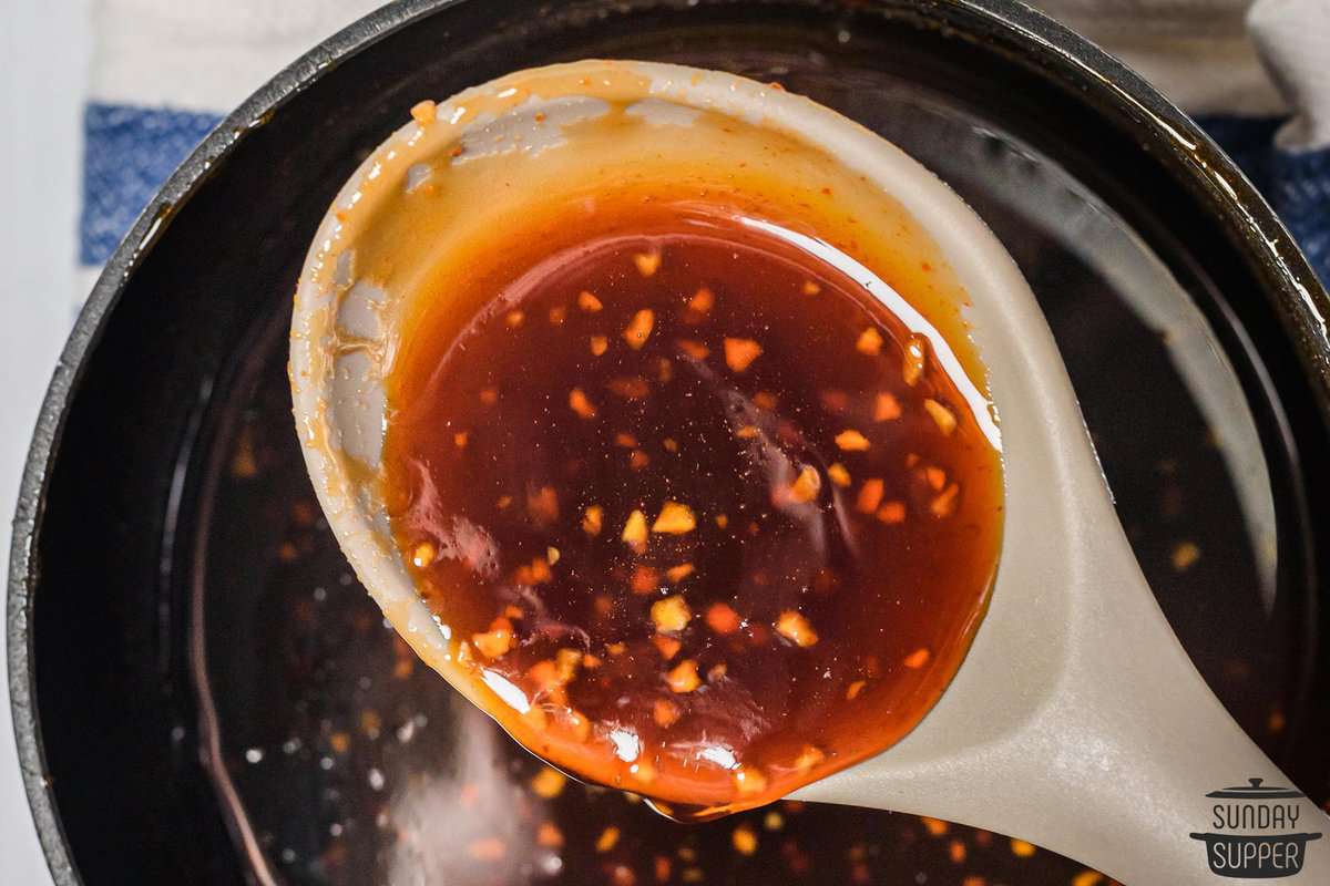 thick honey sriracha in a spoon