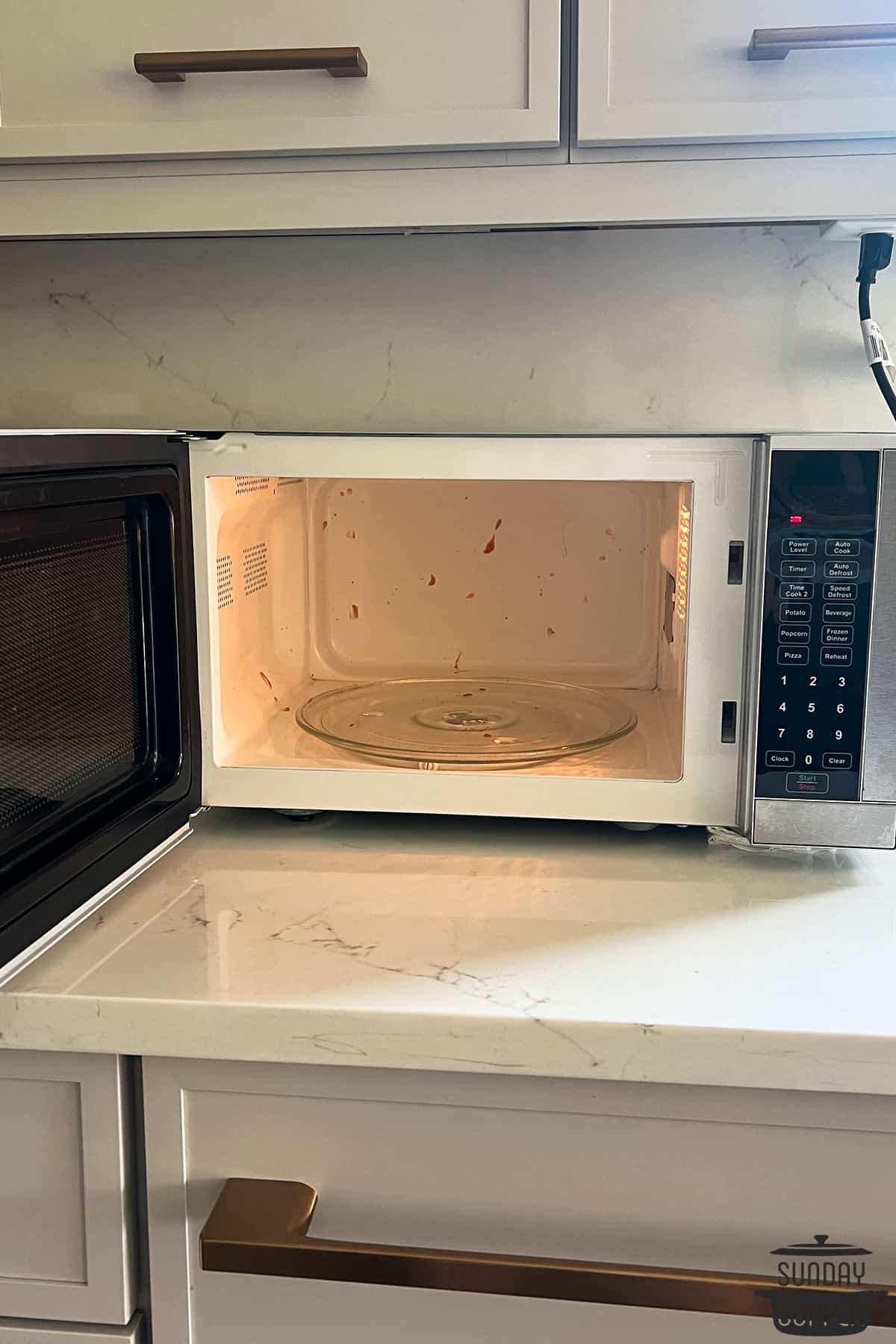 a spattered and dirty microwave