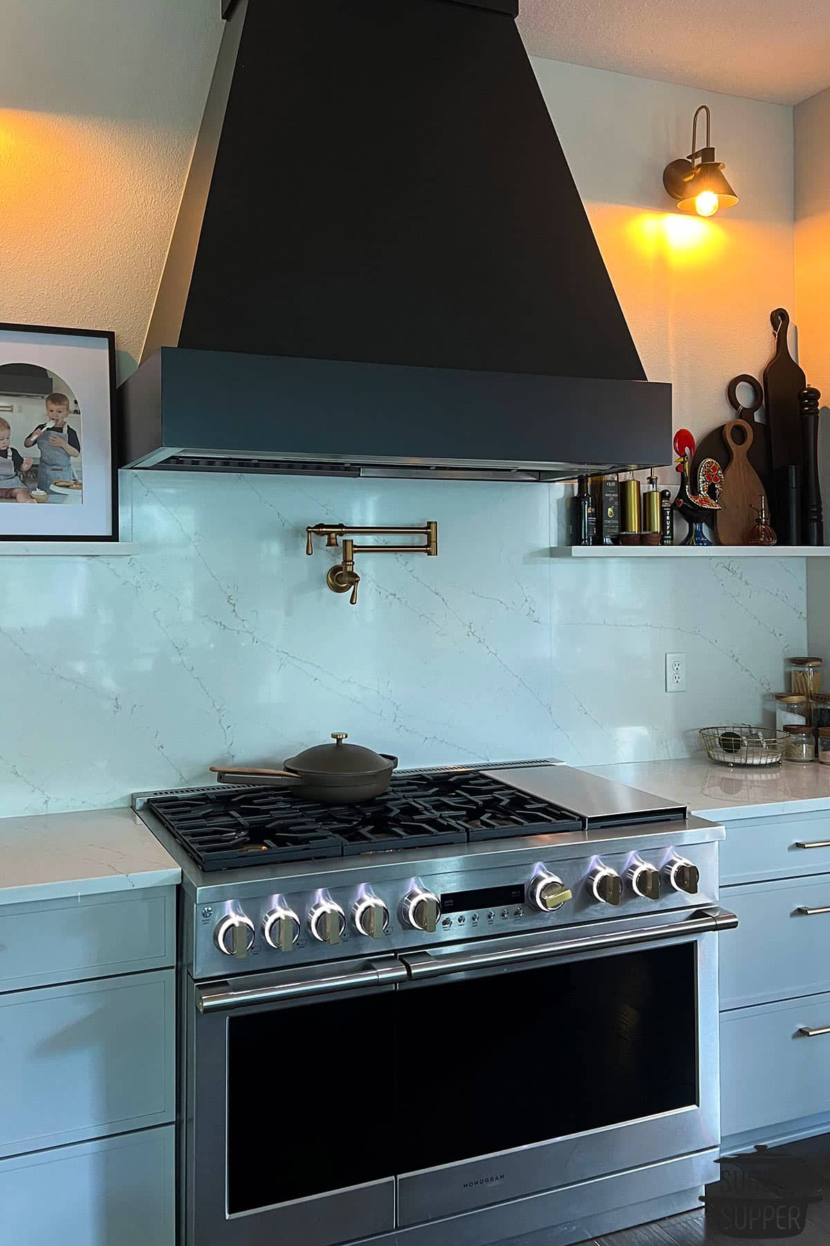 a quartz countertop and gas range