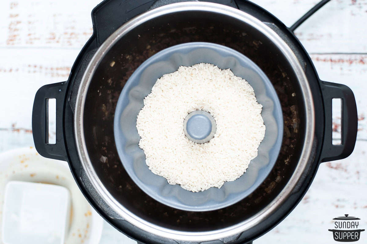 a pot of rice added to the instant pot