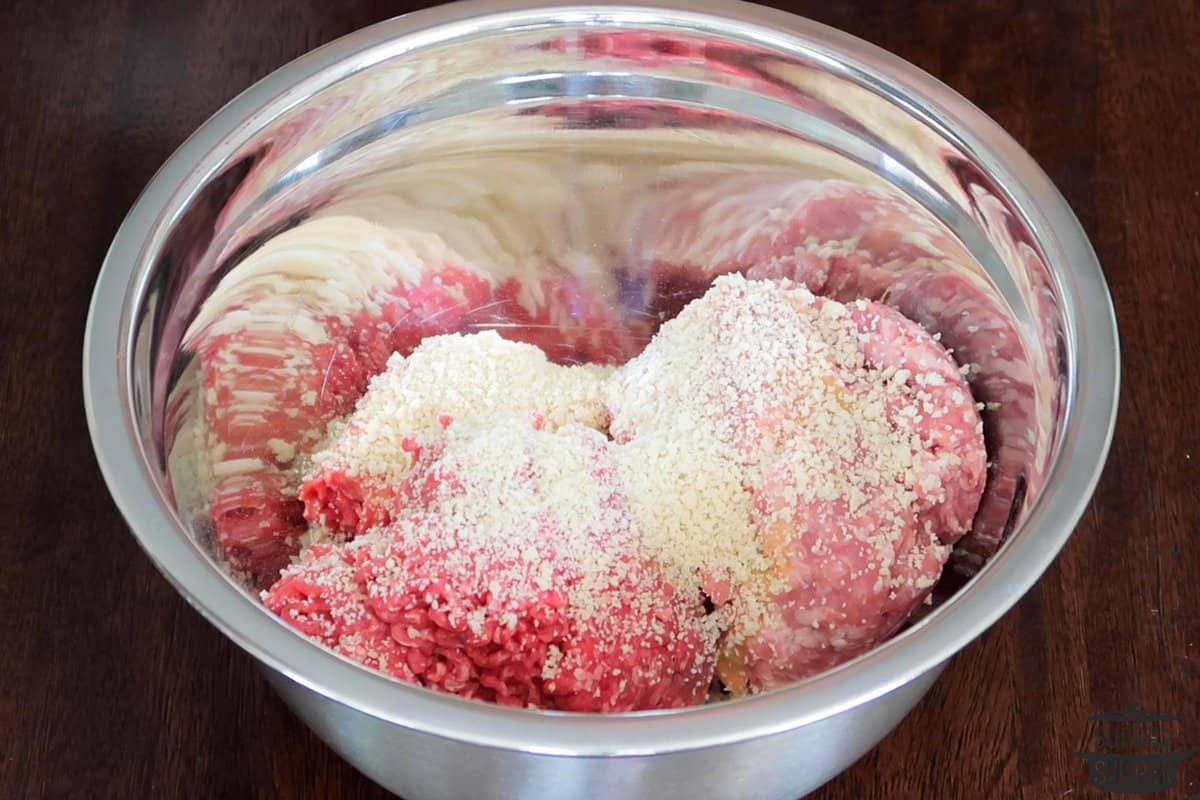 all the ingredients for korean meatballs in a mixing bowl