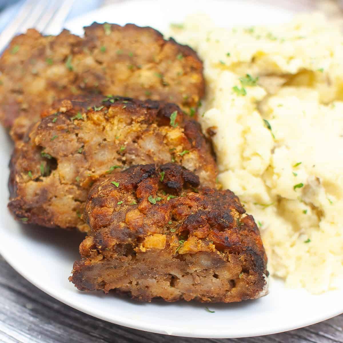 three slices of meatloaf on a plate