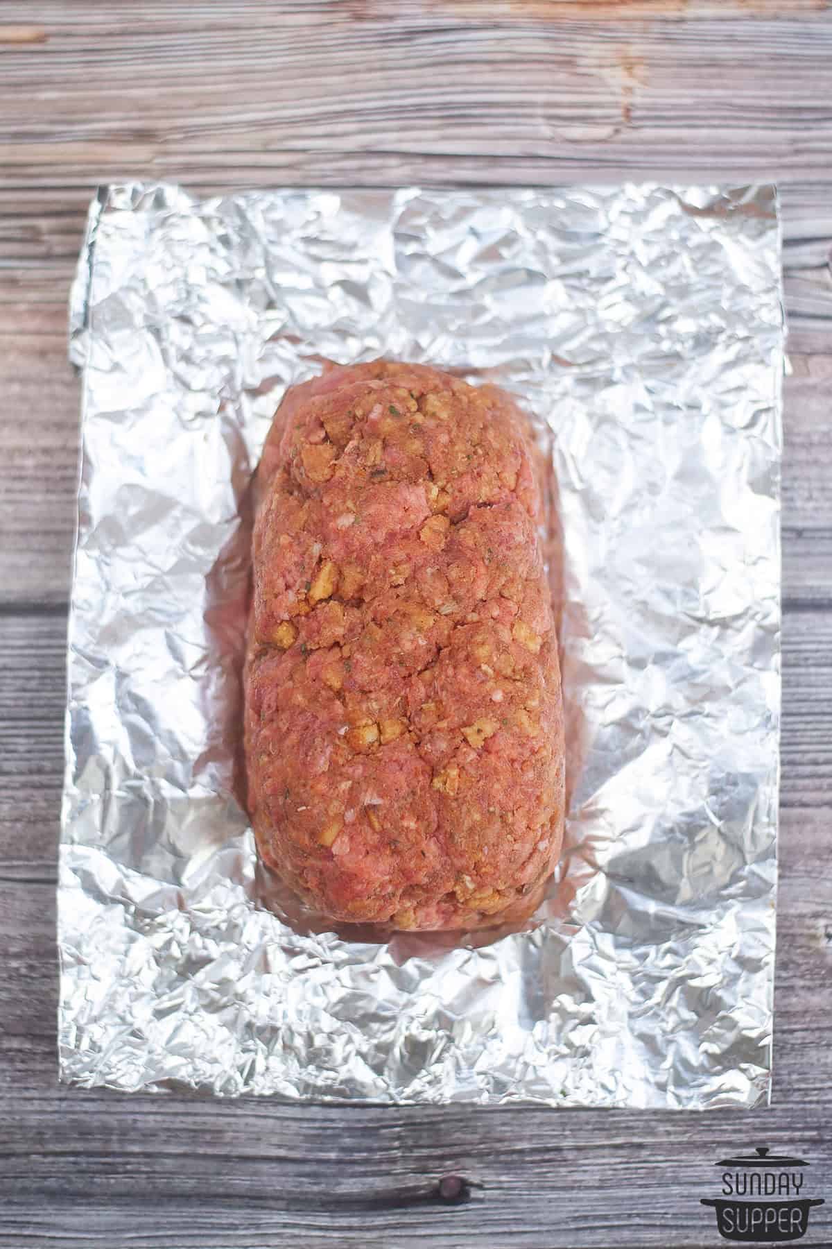 a meatloaf formed in a piece of foil