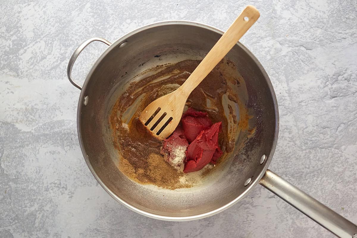 the tomato paste added to the enchilada sauce bowl