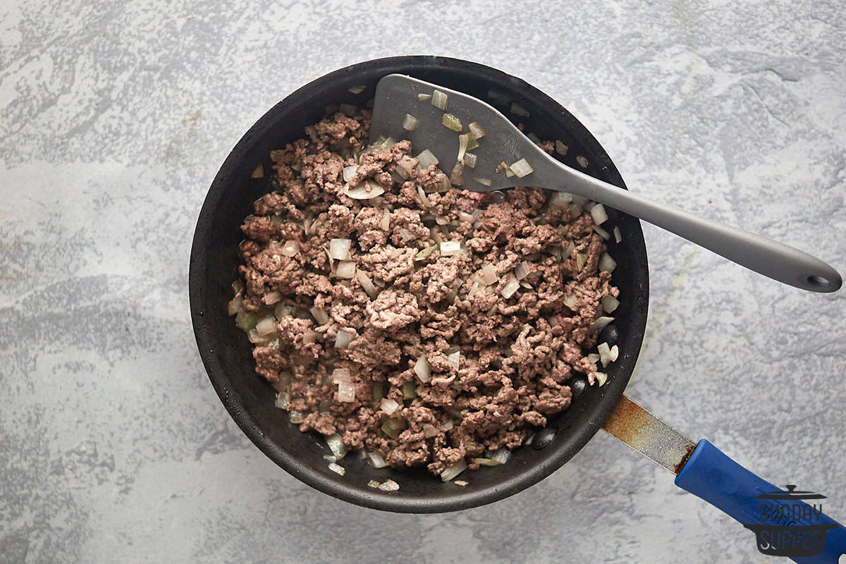 the onions and beef in a pan to brown