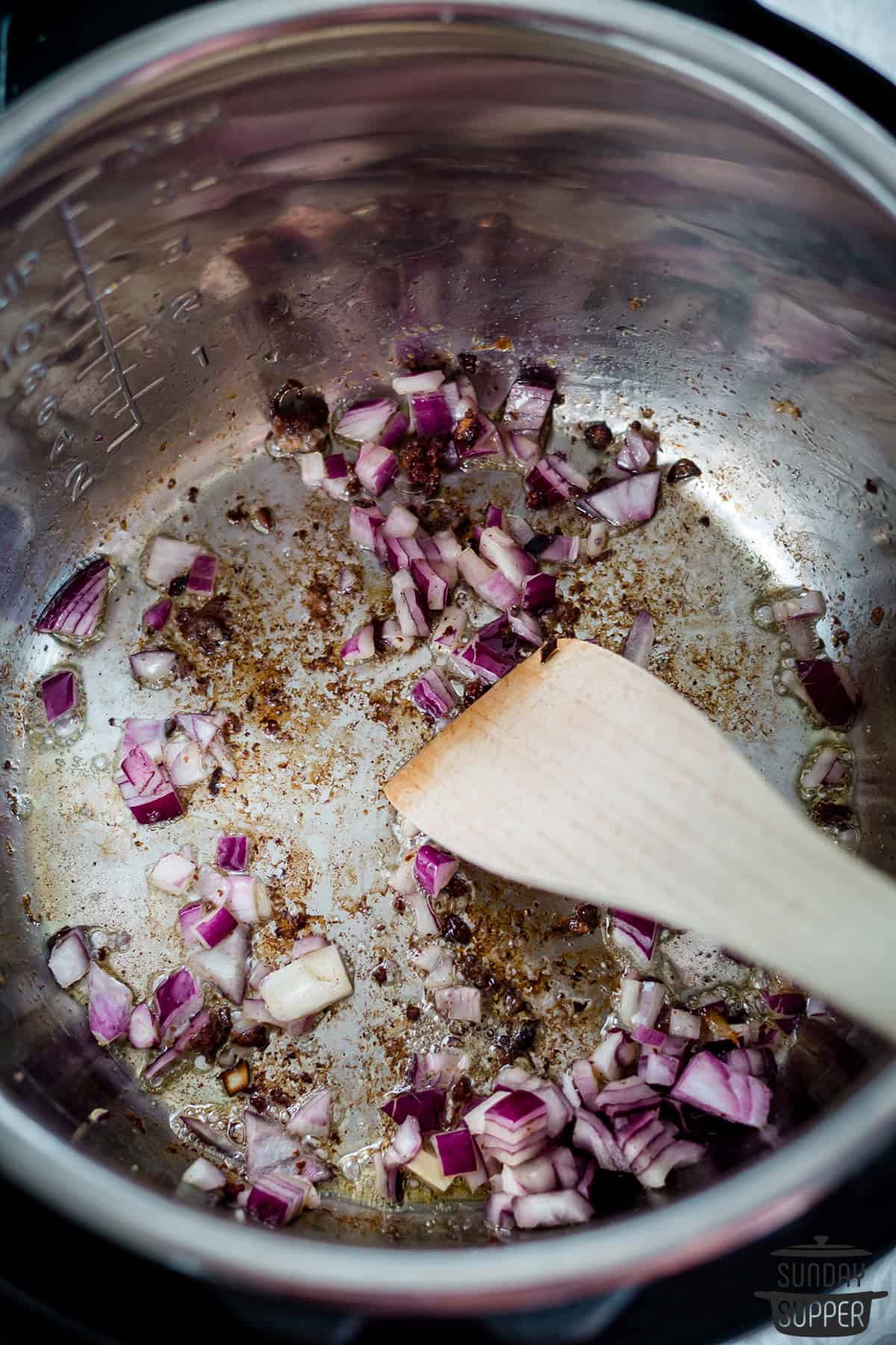 the onions being browned