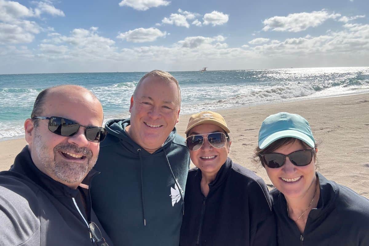 Isabel and Ron at the beach with friends