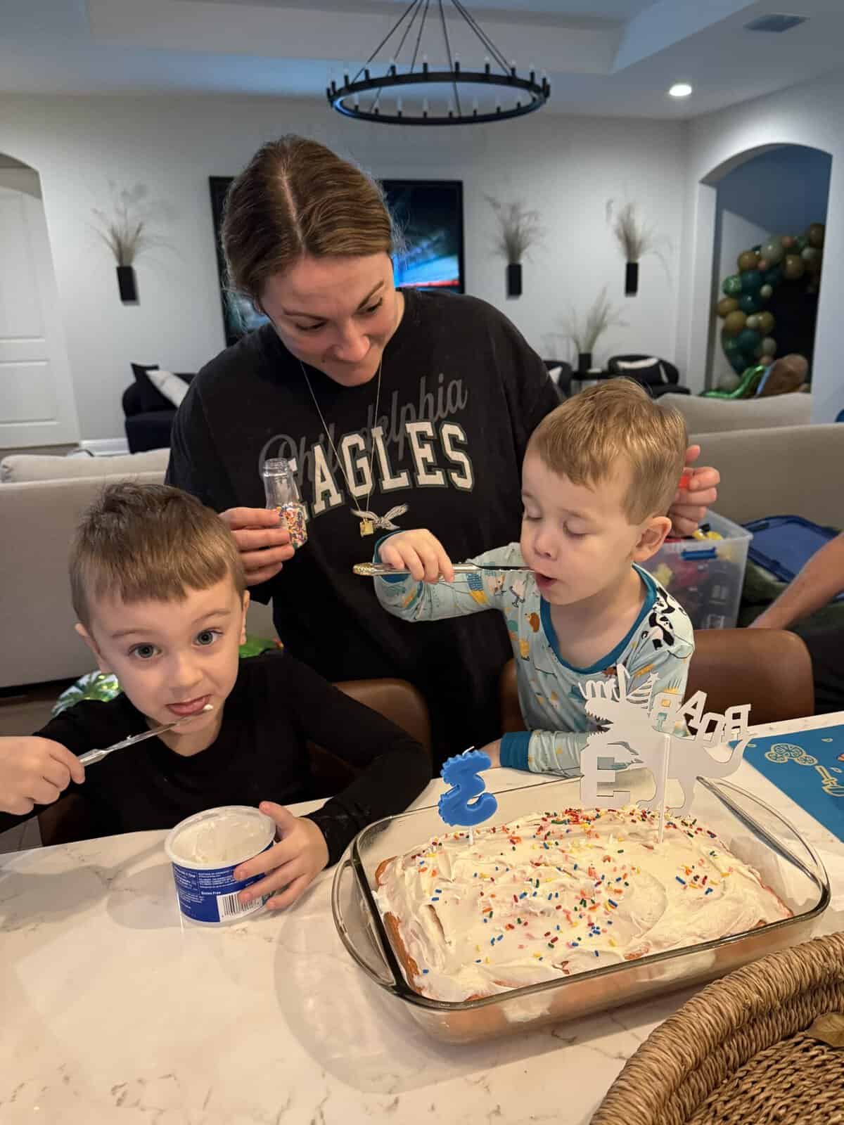 aiden and rory making a cake with their mom alex