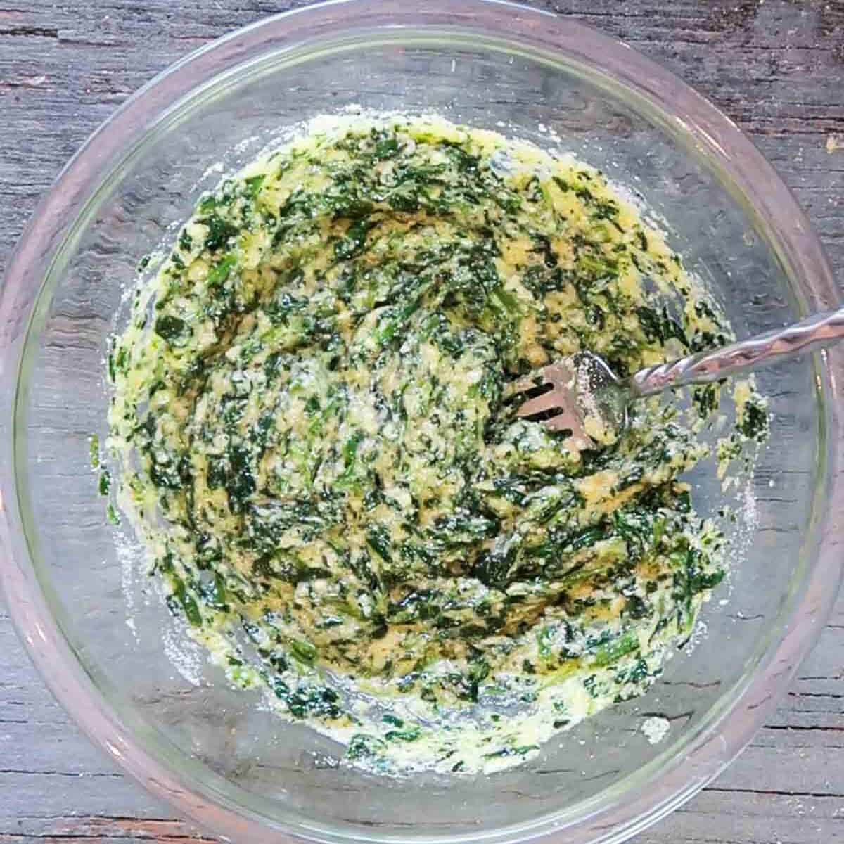 After mixing Parmesan into spinach egg mixture for Italian wedding soup