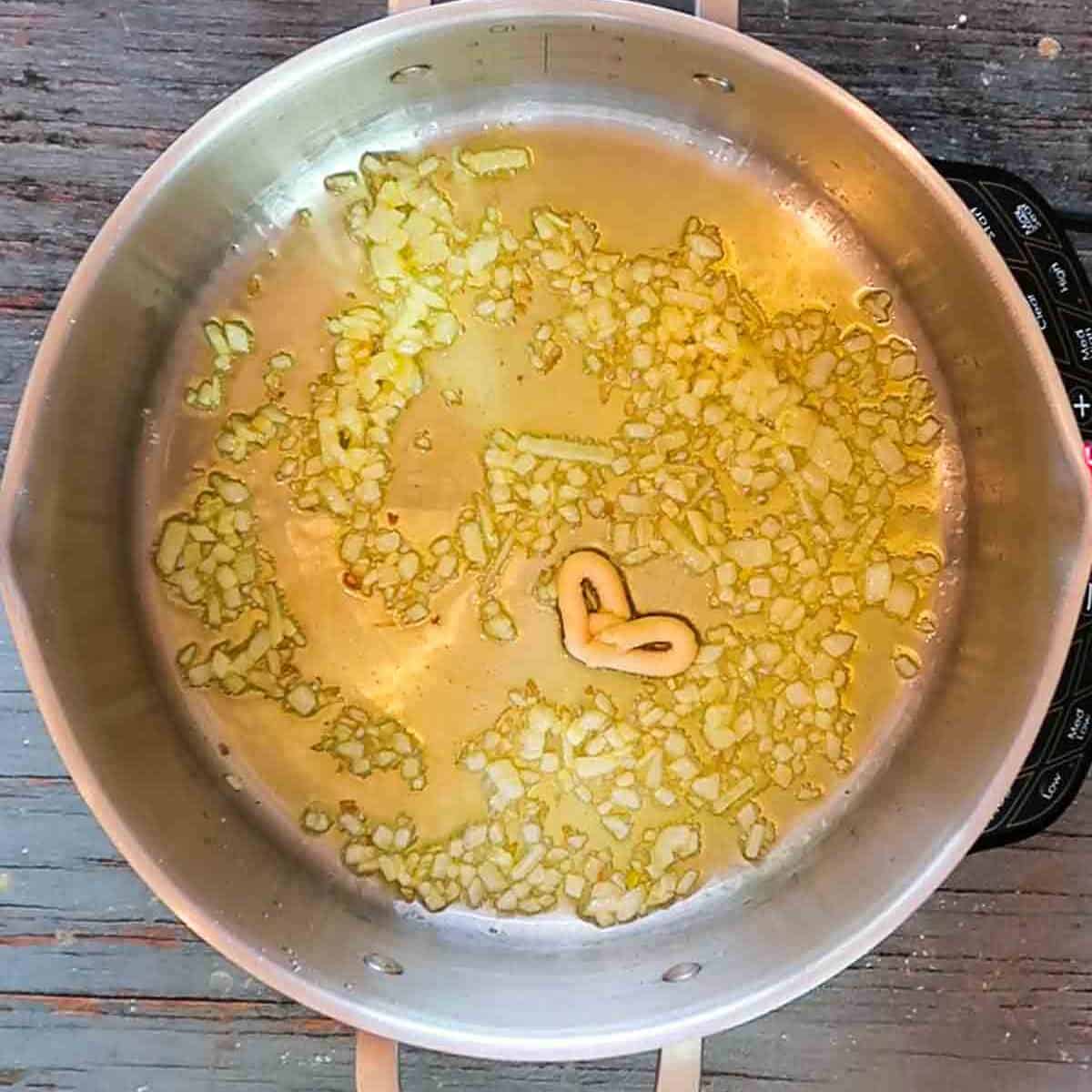 After adding garlic paste to pot for Italian wedding soup