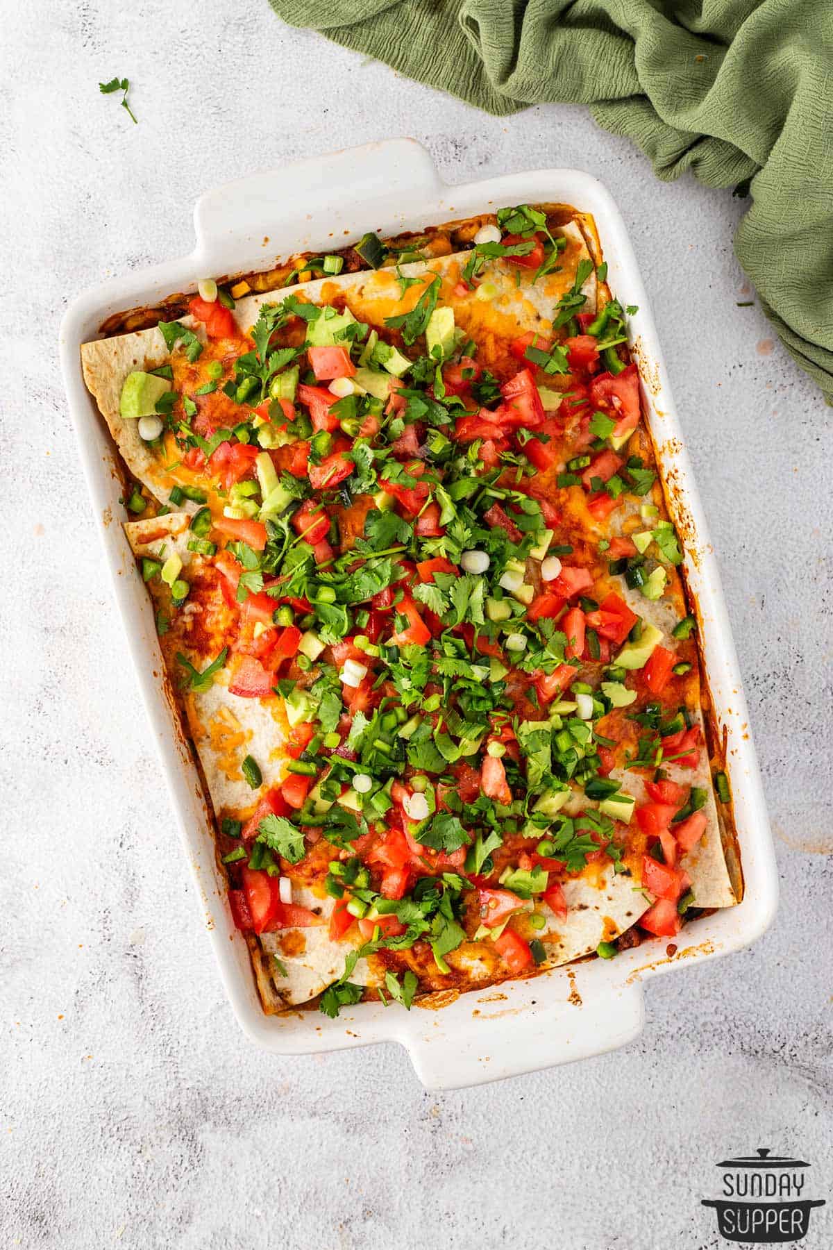 a completed beef enchilada casserole with topping