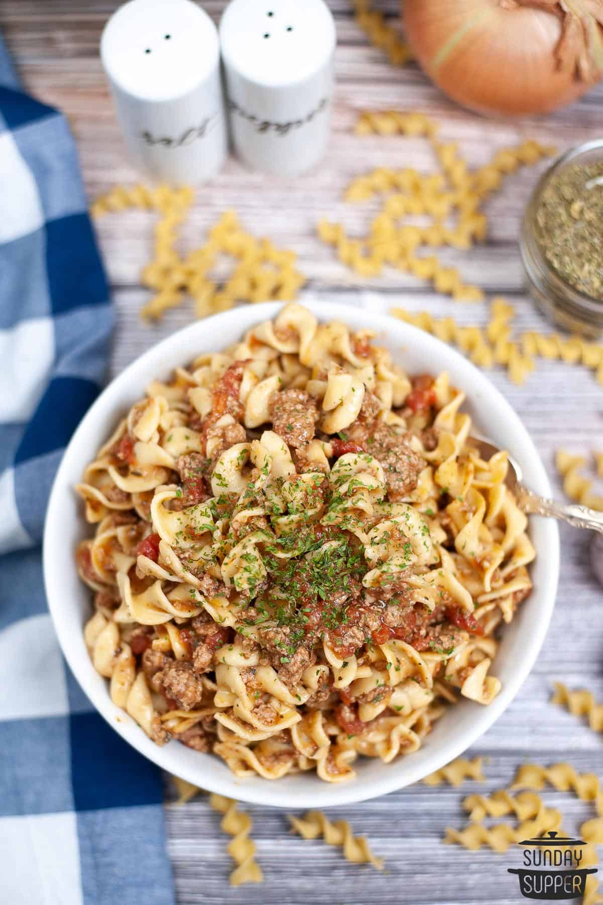 a bowl of completed instant pot beef goulash with dill