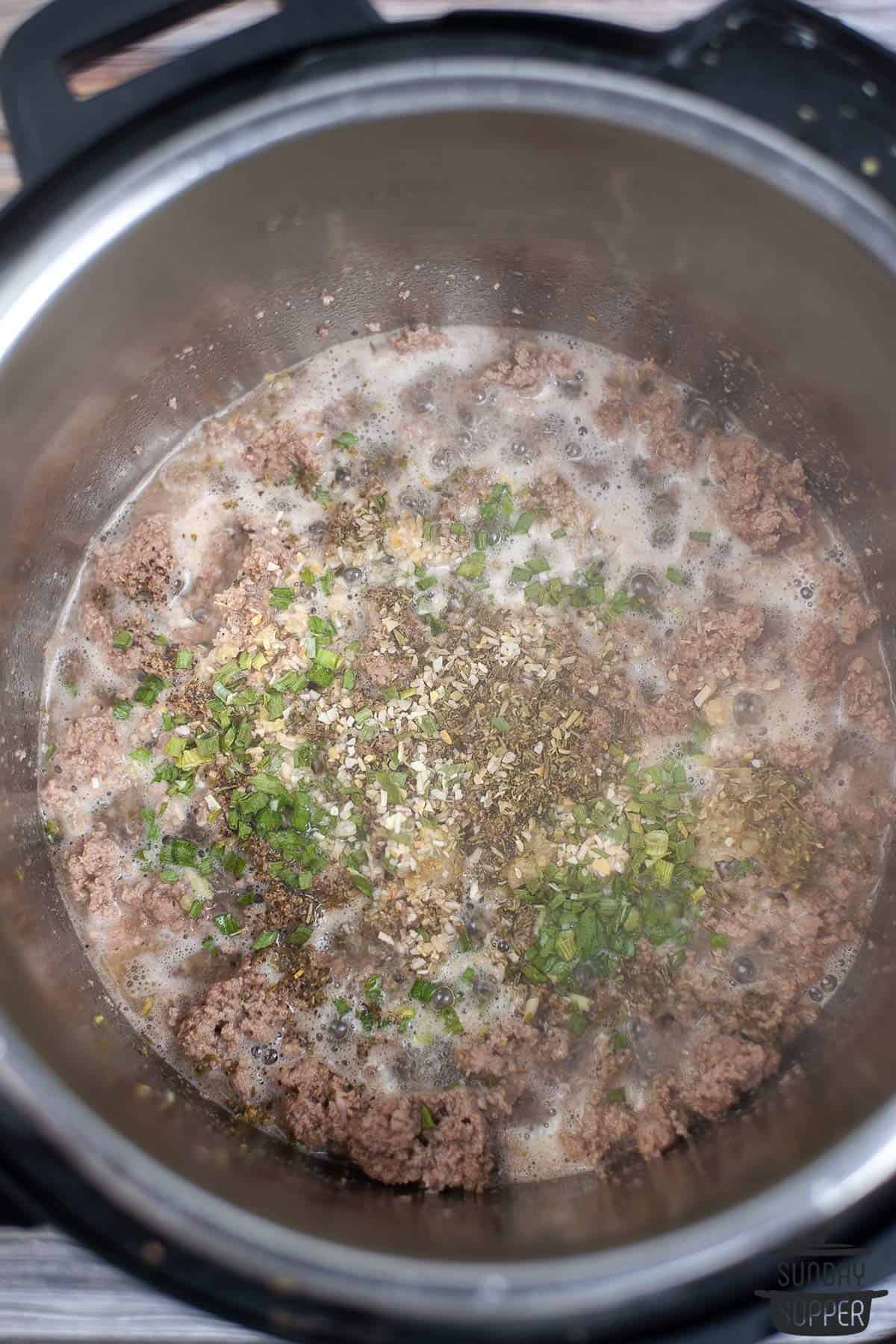 the beef and seasonings in the instant pot