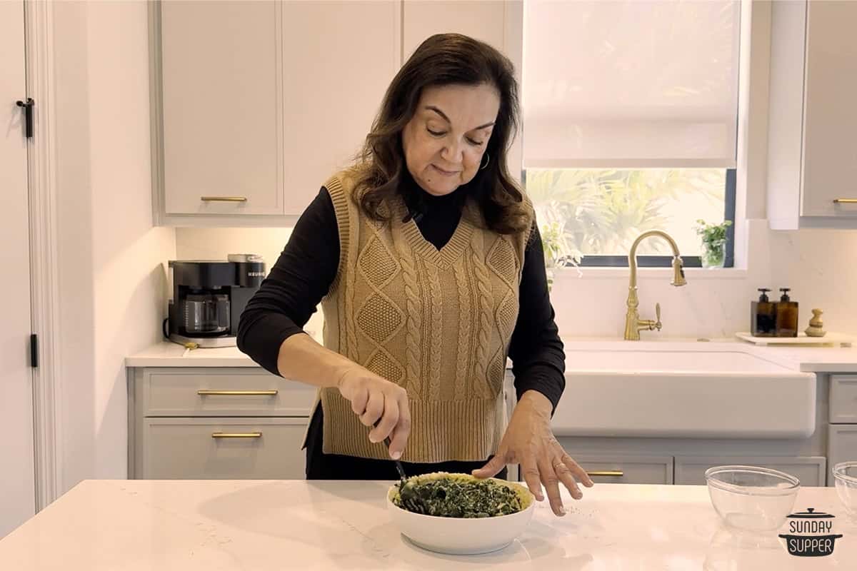 Mixing the spinach and egg mixture