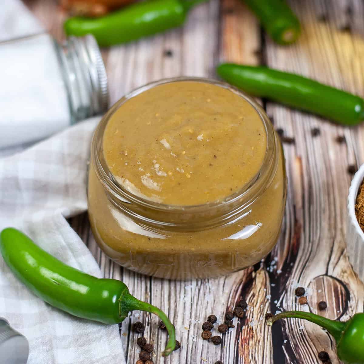 enchilada sauce in a jar with jalapenos