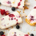 cheesecake popsicles with extra berries
