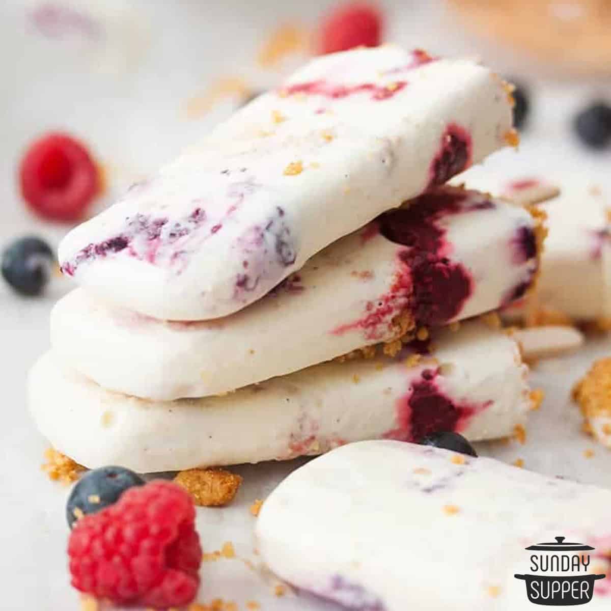 a pile of cheesecake popsicles