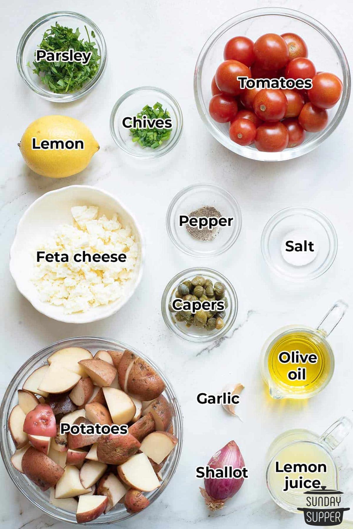 all the ingredients for greek lemon potatoes with labels