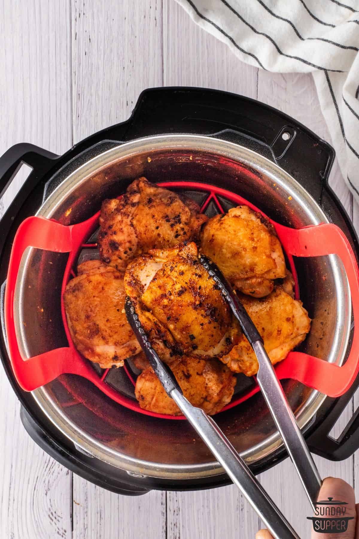 adding chicken thighs to trivet