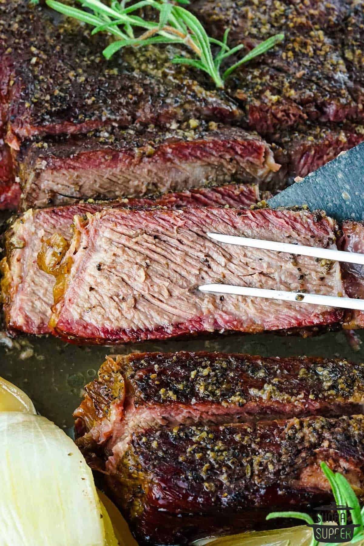 beef chuck roast being sliced