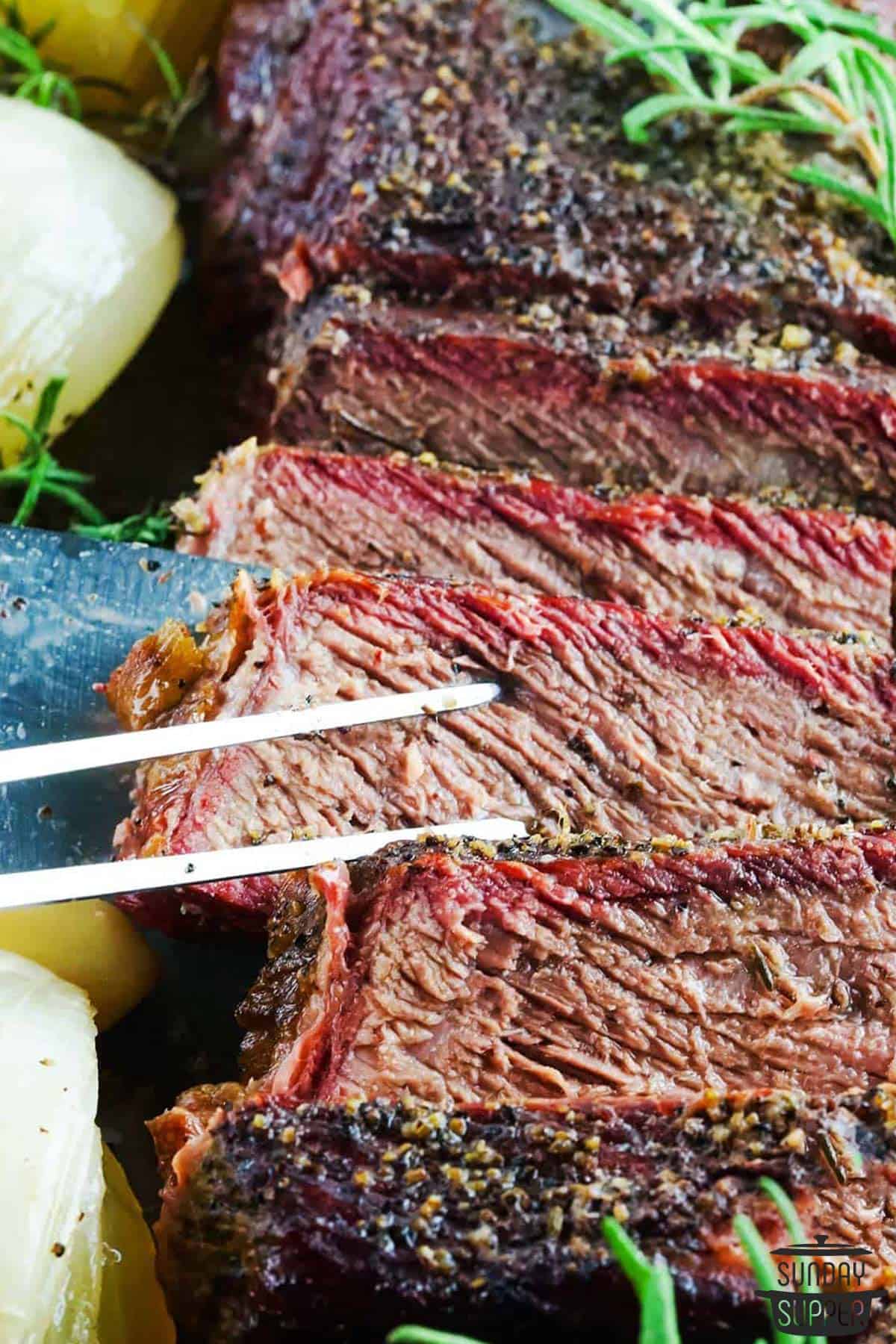 sliced chuck roast ready to serve