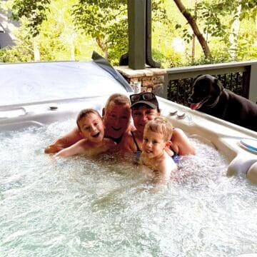 Isabel, Ron, Rory, and Aiden all in the hot tub