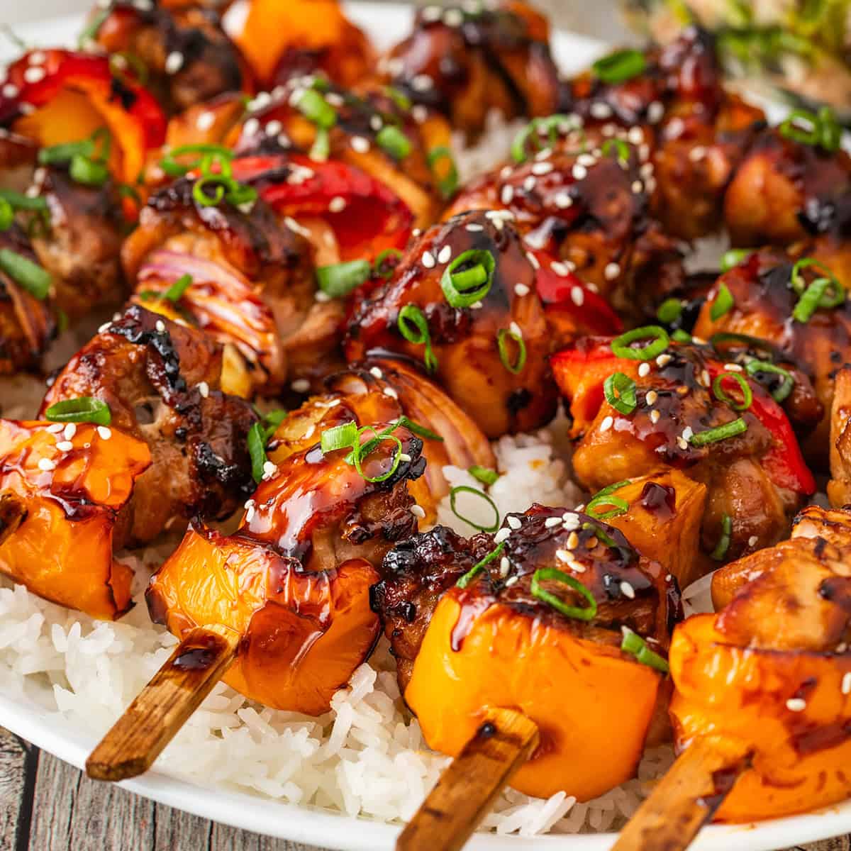 teriyaki chicken skewers on a plate