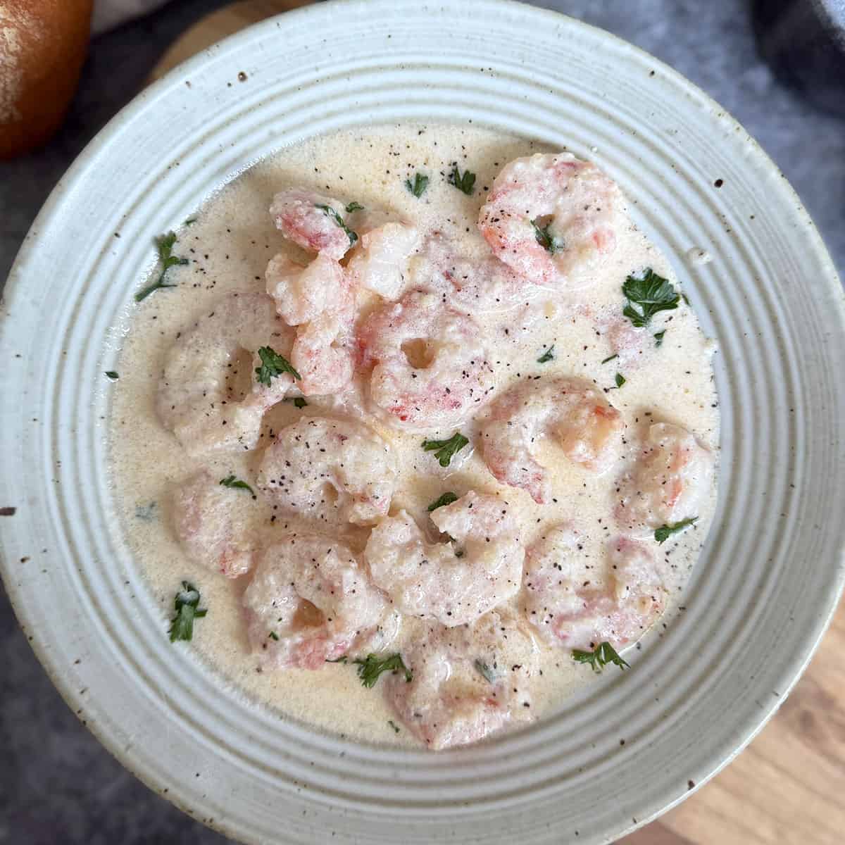 garlic cream shrimp in a shallow bowl