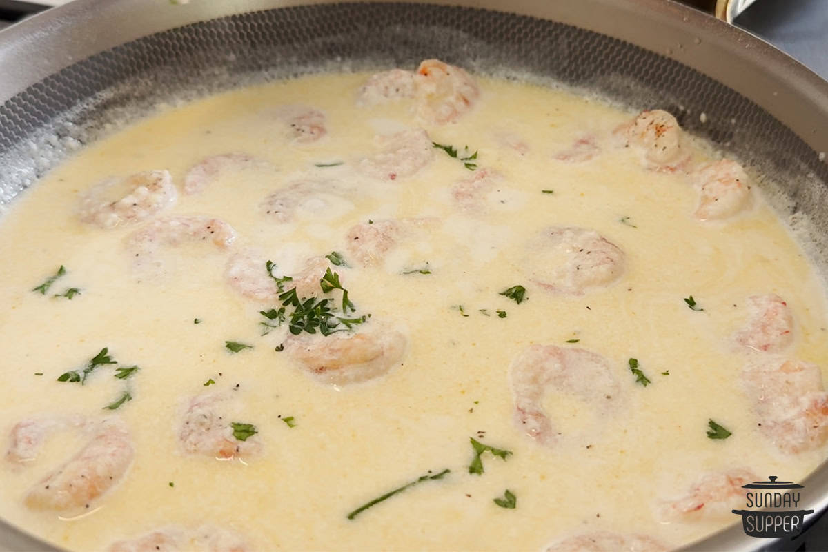 garlic parmesan shrimp in the pan