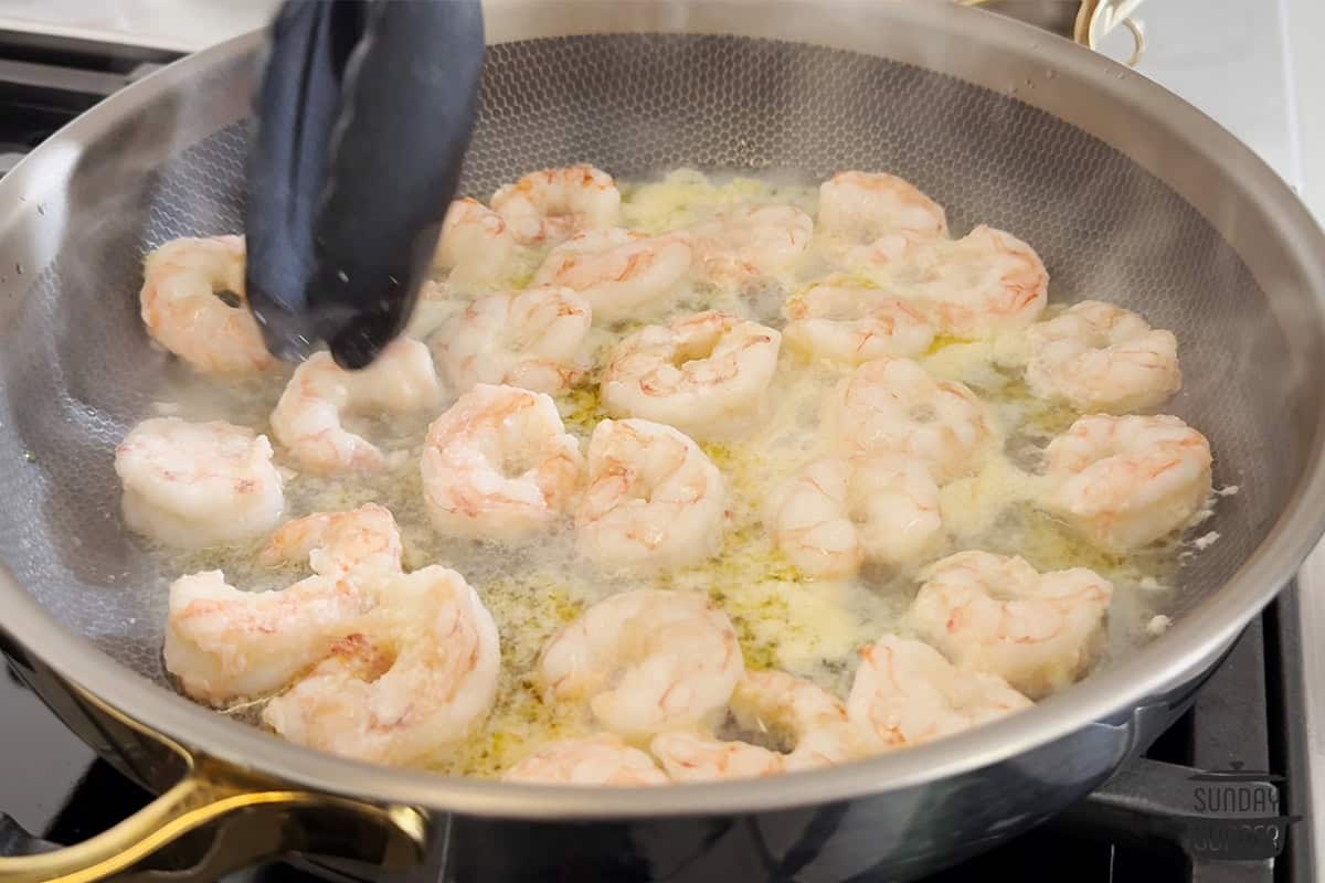 Shrimp bubbling in sauce