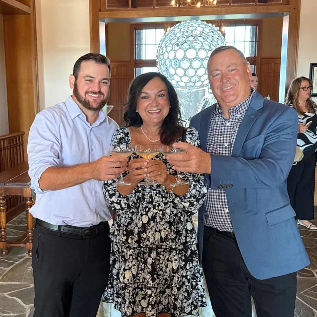 isabel, ron, and ronnie at the clubhouse for dinner